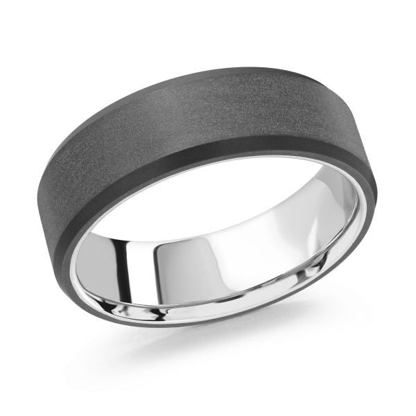 White gold black ceramic wedding band ring on a white background.