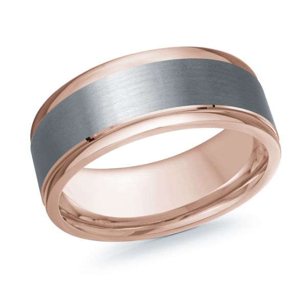 Rose gold black ceramic wedding band ring on a white background.