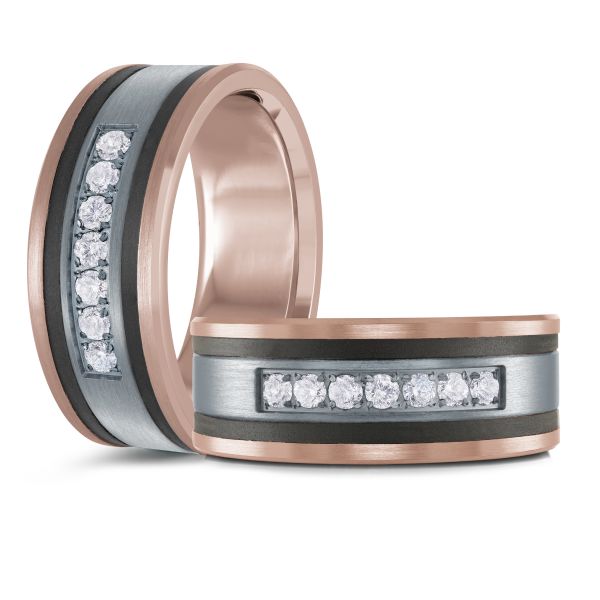 Black ceramic wedding band with a rose gold interior, diamond accents, and a brushed silver inlay on a white background.