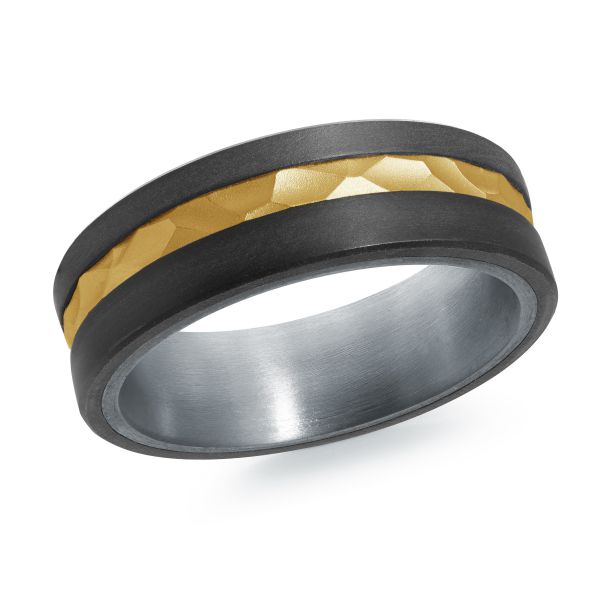 Black ceramic wedding band with a gold inlay and hammered texture on a white background.