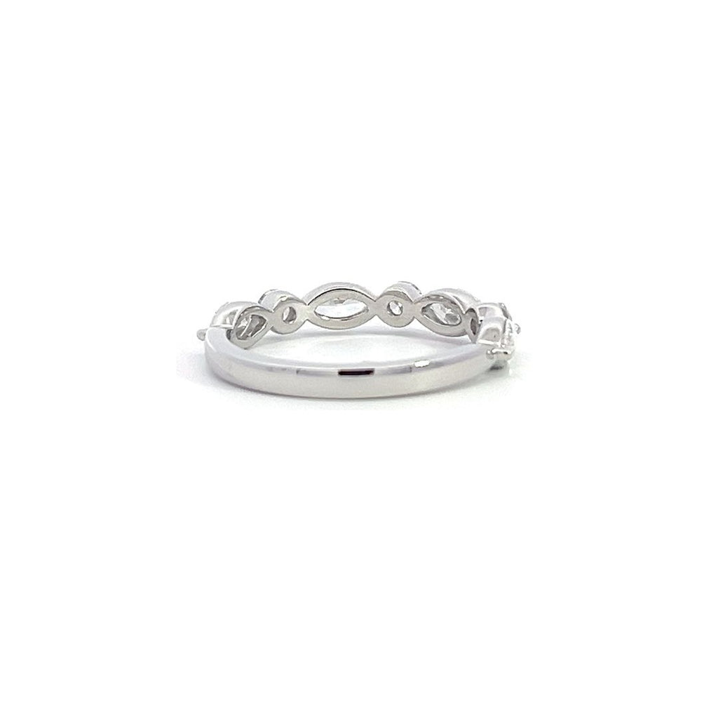 Silver eternity band with alternating round and marquise-shaped diamonds, on a white background.