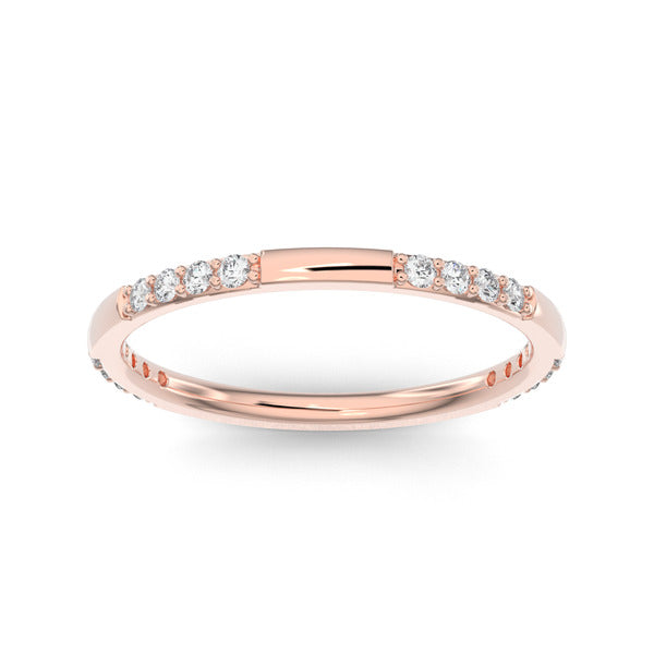 Rose gold band ring with rows of diamonds on a white background.