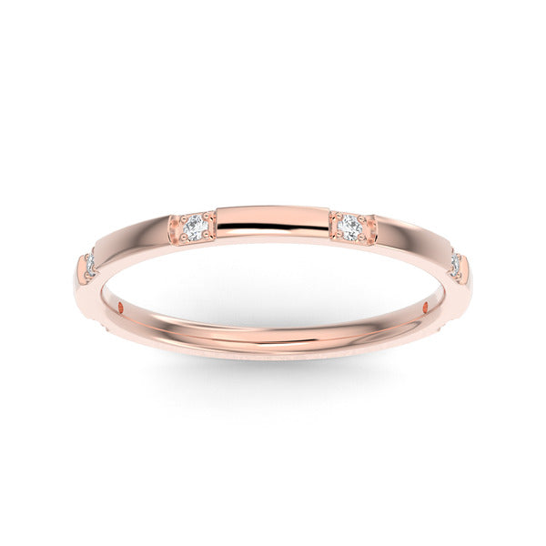 Rose gold wedding band with diamond accent on a white background.