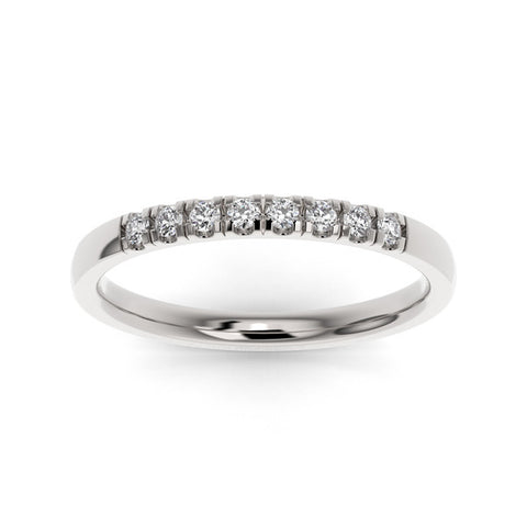 Silver  wedding band with diamond accent on a white background.