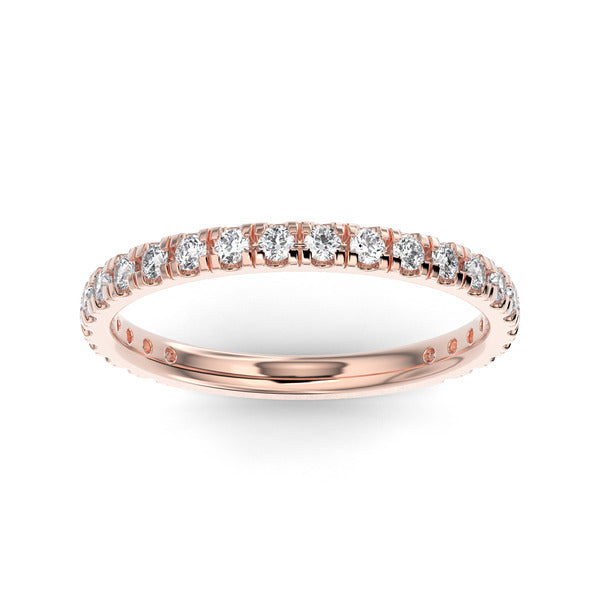 Rose gold wedding band with diamond accent on a white background.