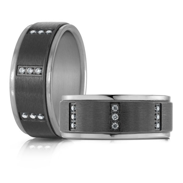 Titanium wedding band with a black carbon fiber inlay and diamond accents on a white background.