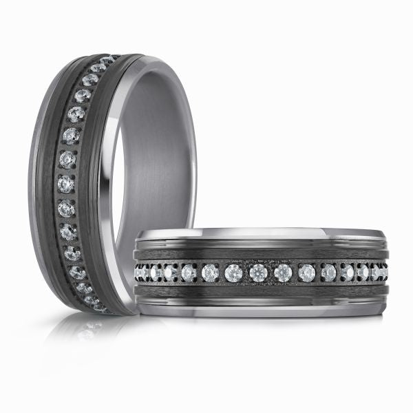 Titanium wedding band with a black carbon fiber inlay and diamond accents on a white background.