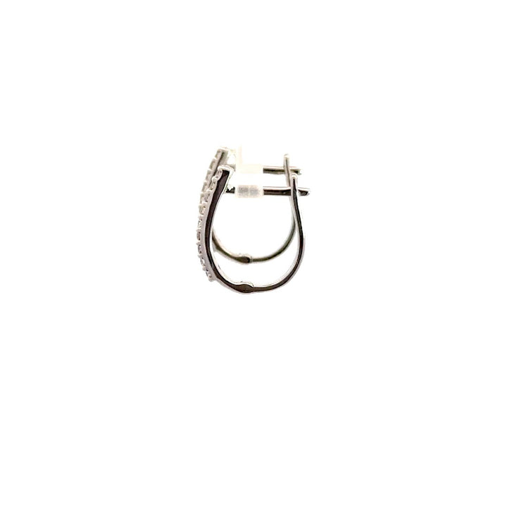 Silver hoop earrings on a white background.