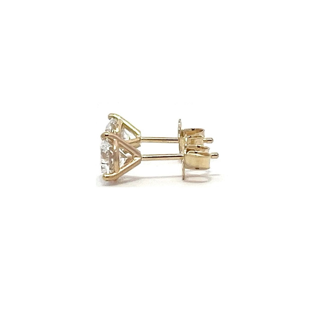 Yellow gold stud earrings with round diamonds on a white background.