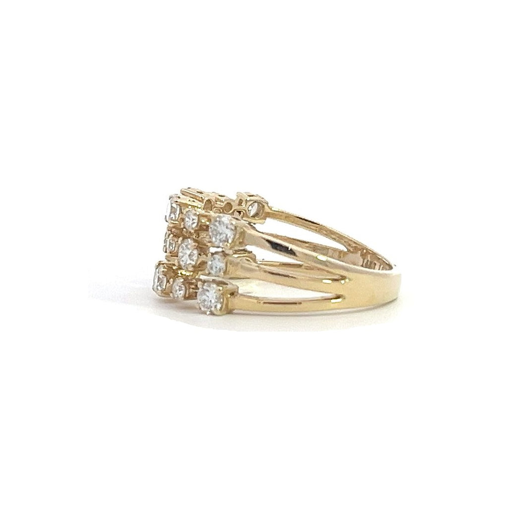 Yellow gold ring with three rows of diamonds, on a white background.