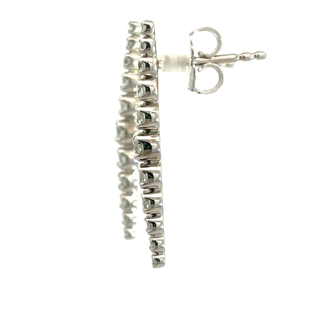 Diamond drop earrings on a white background