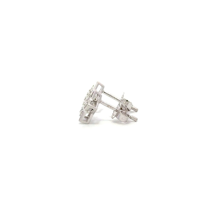 Silver diamond stud earrings on a white background.