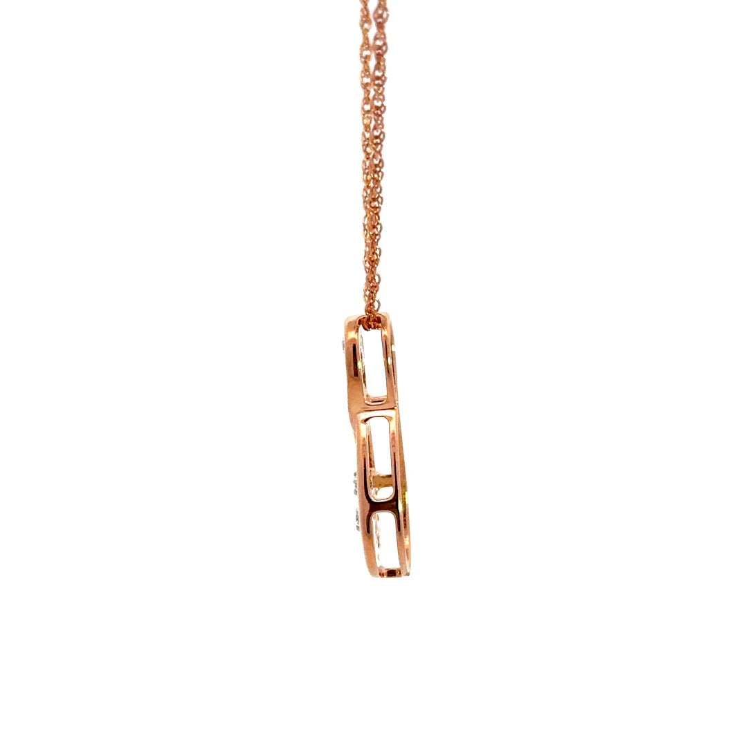 Rose gold infinity necklace with diamonds on a white background