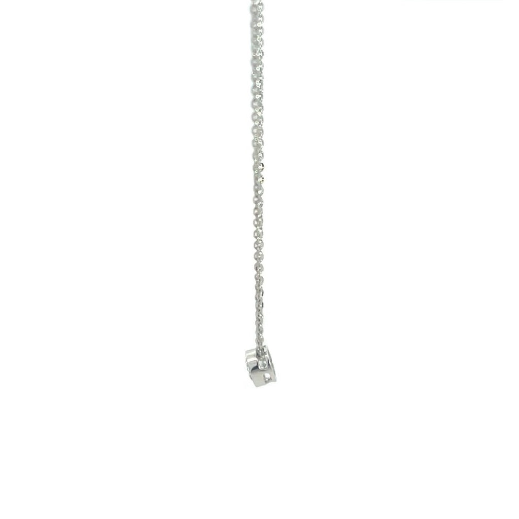 Silver necklace with a round diamond solitaire pendant on a white background.