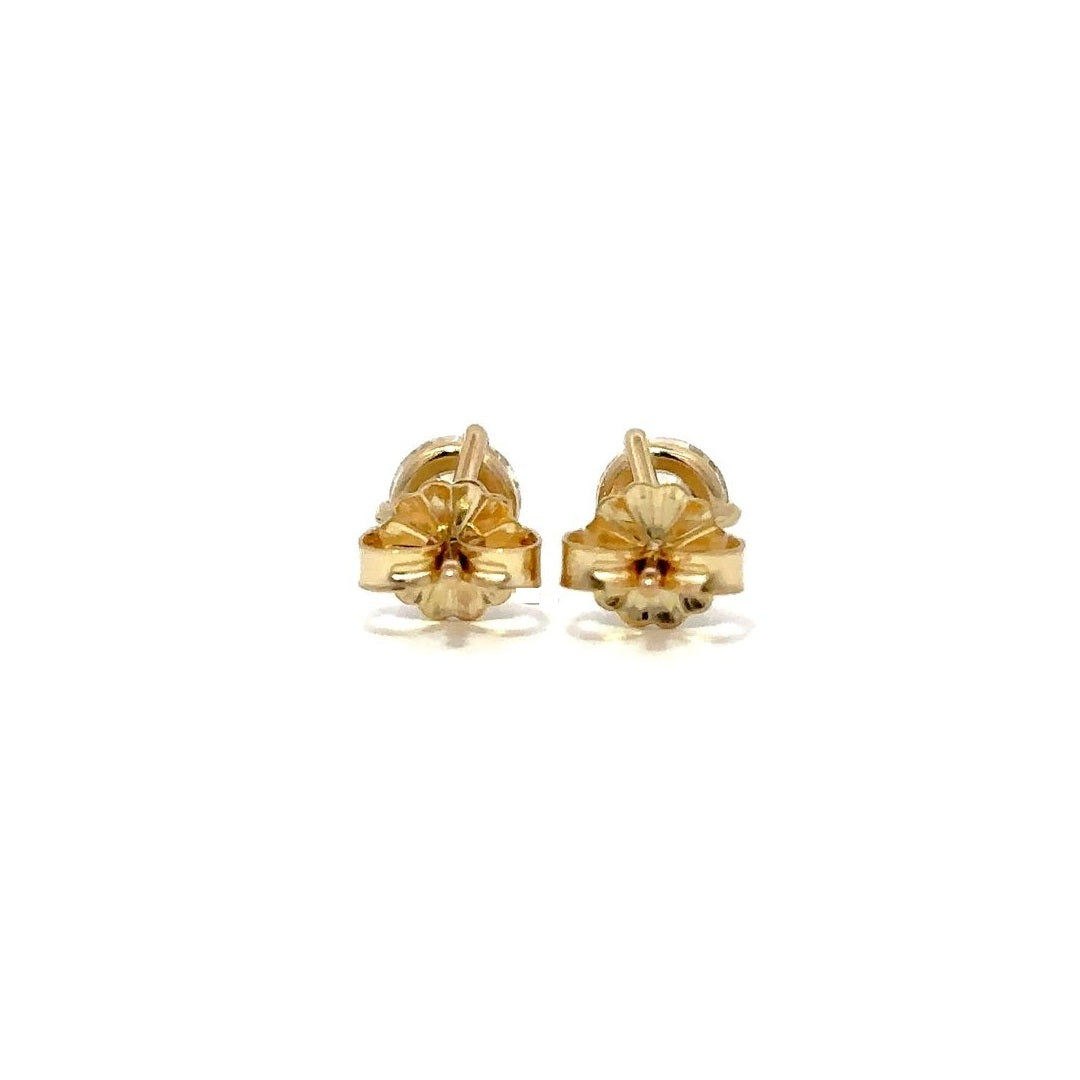 Yellow gold diamond stud earrings on a white background.*