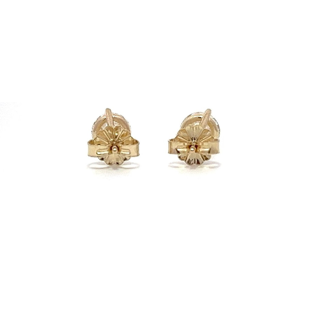 Yellow gold stud earrings with round diamonds on a white background.