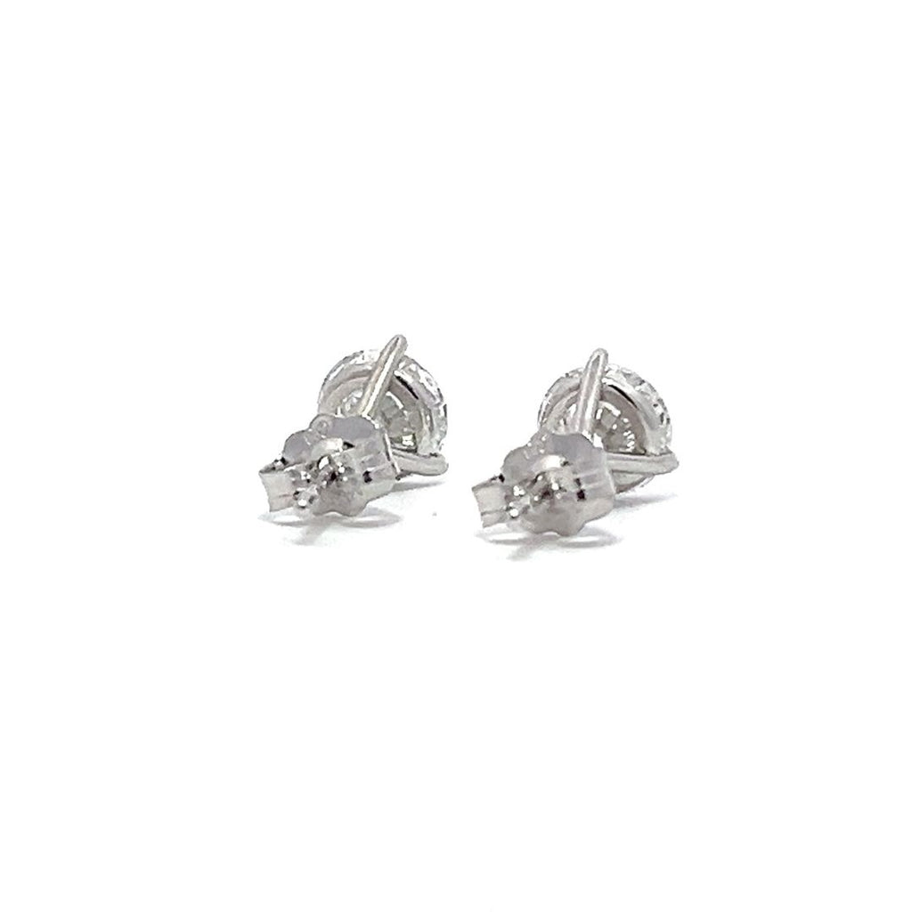 White gold stud earrings with round diamonds on a white background.