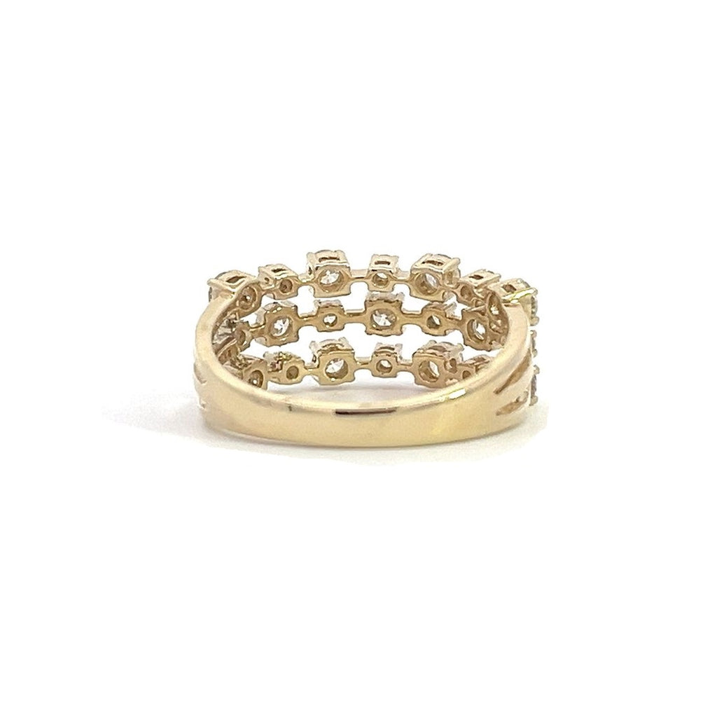 Yellow gold ring with three rows of diamonds, on a white background.