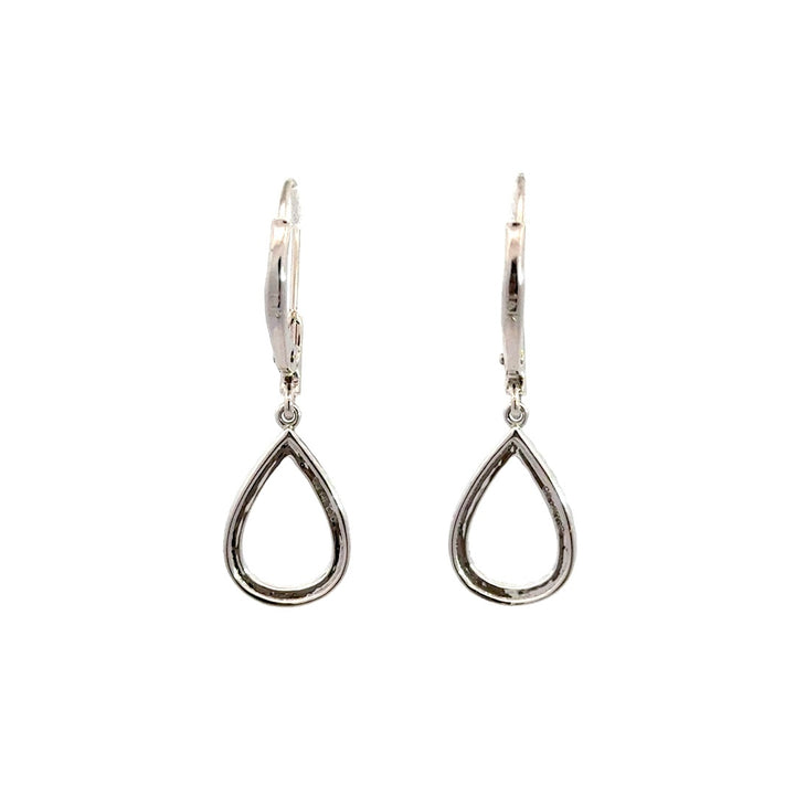 Silver teardrop dangle earrings on a white background