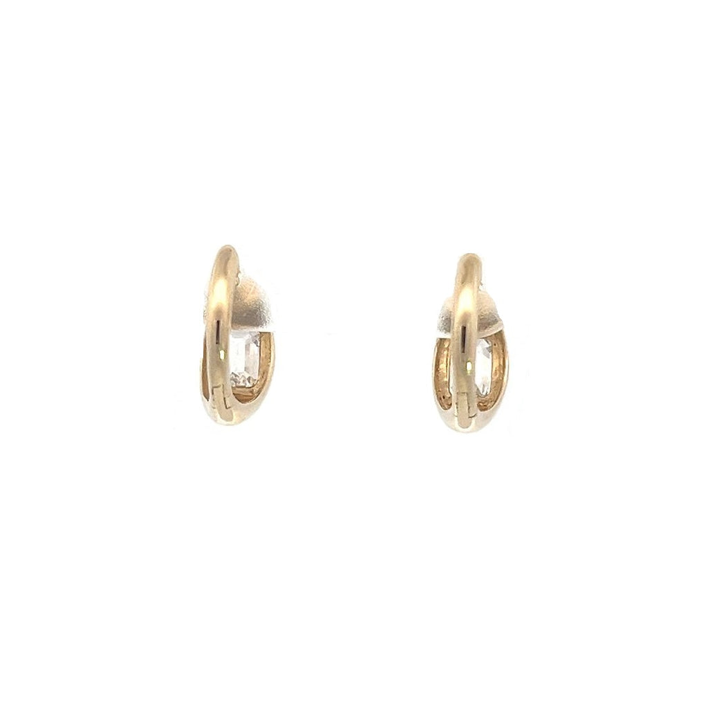 Yellow gold drop earrings with emerald-cut diamonds in an oval setting, on a white background.