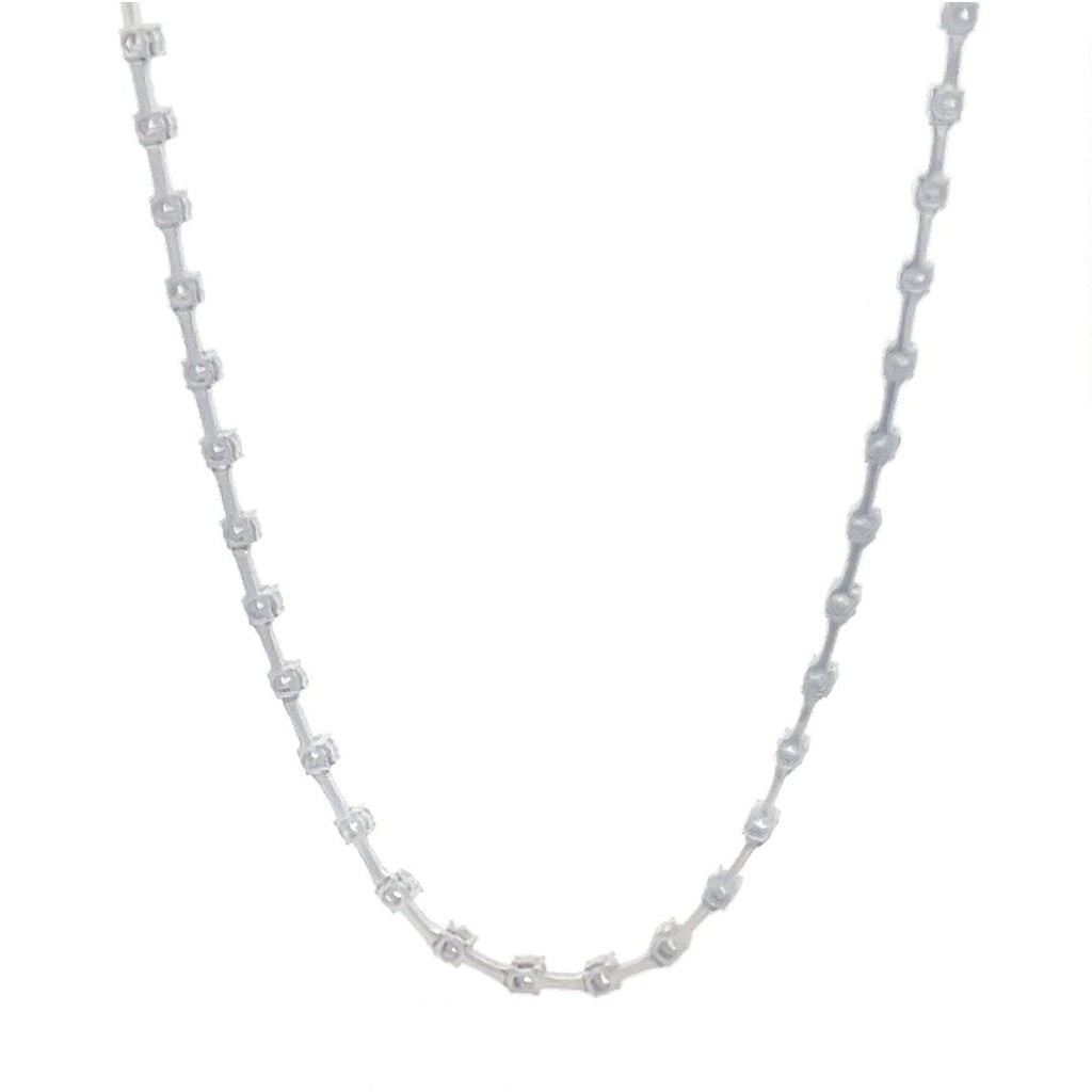 White gold necklace with a row of round diamonds on a white background.