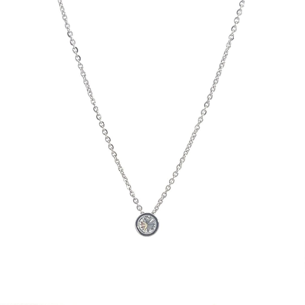 Silver necklace with a round diamond solitaire pendant on a white background.