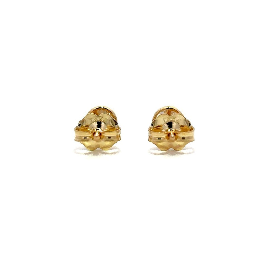 Yellow gold diamond stud earrings on a white background