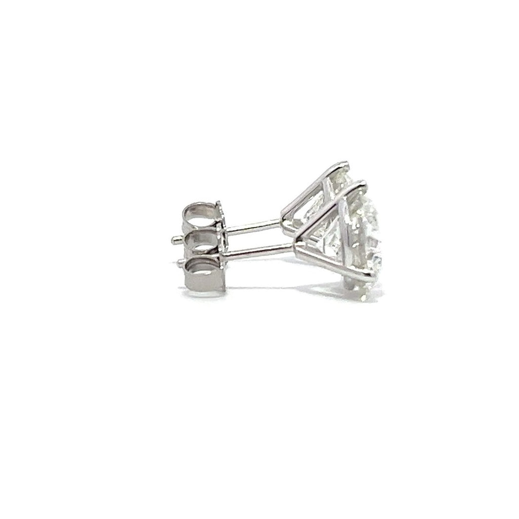 White gold stud earrings with round diamonds on a white background.