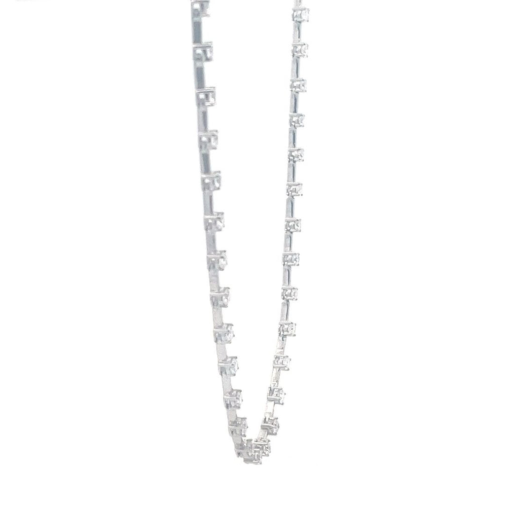 White gold necklace with a row of round diamonds on a white background.