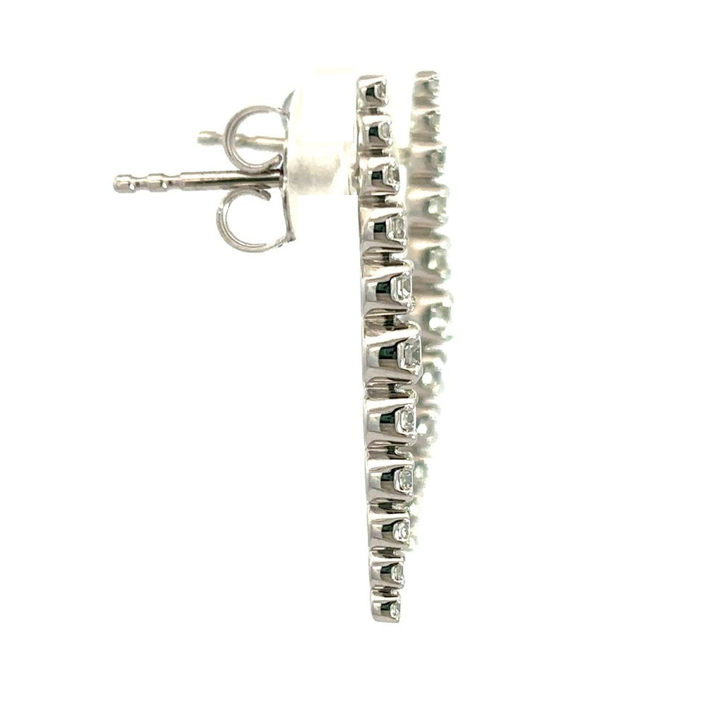 Diamond drop earrings on a white background