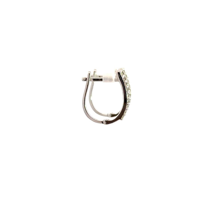 Silver hoop earrings on a white background.