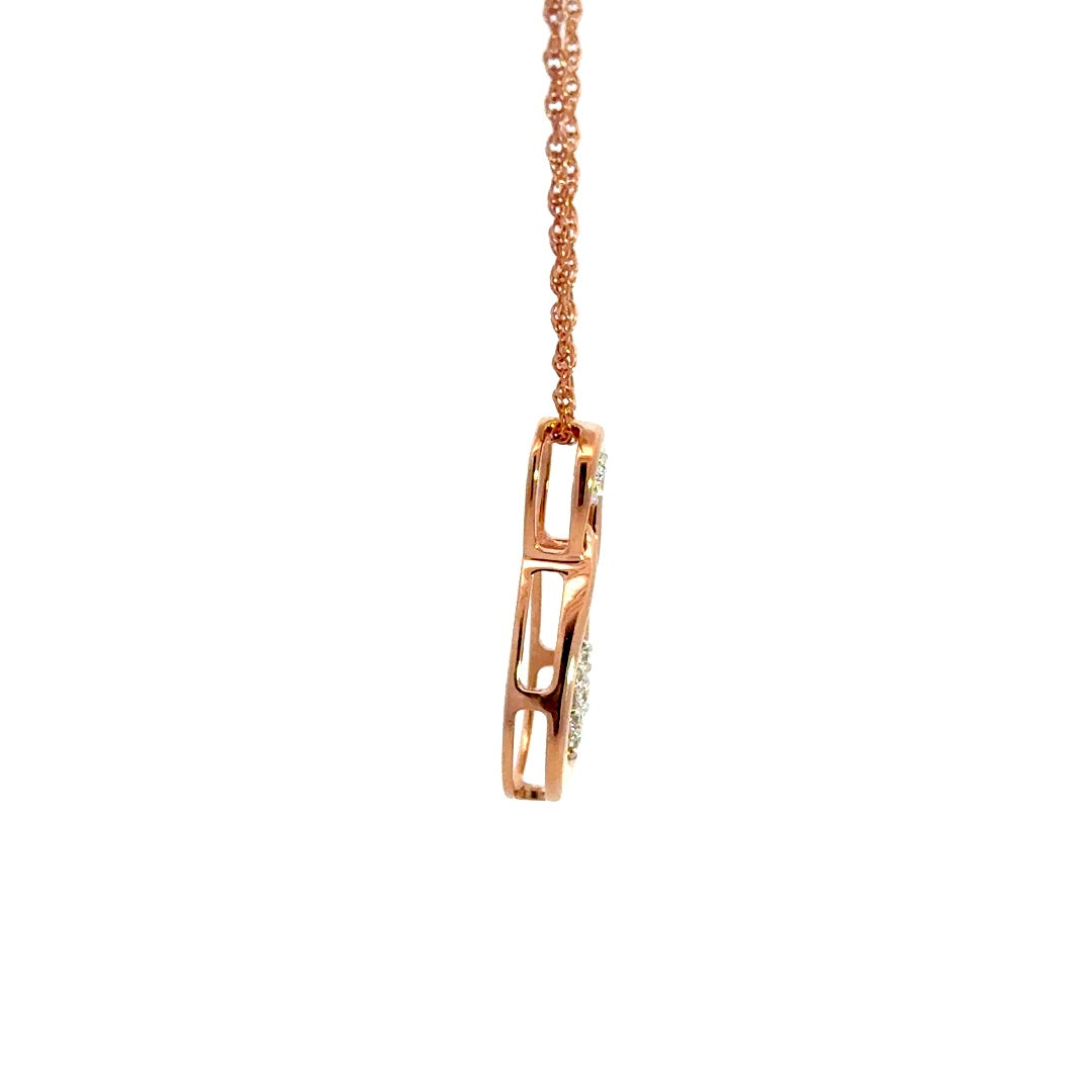 Rose gold infinity necklace with diamonds on a white background