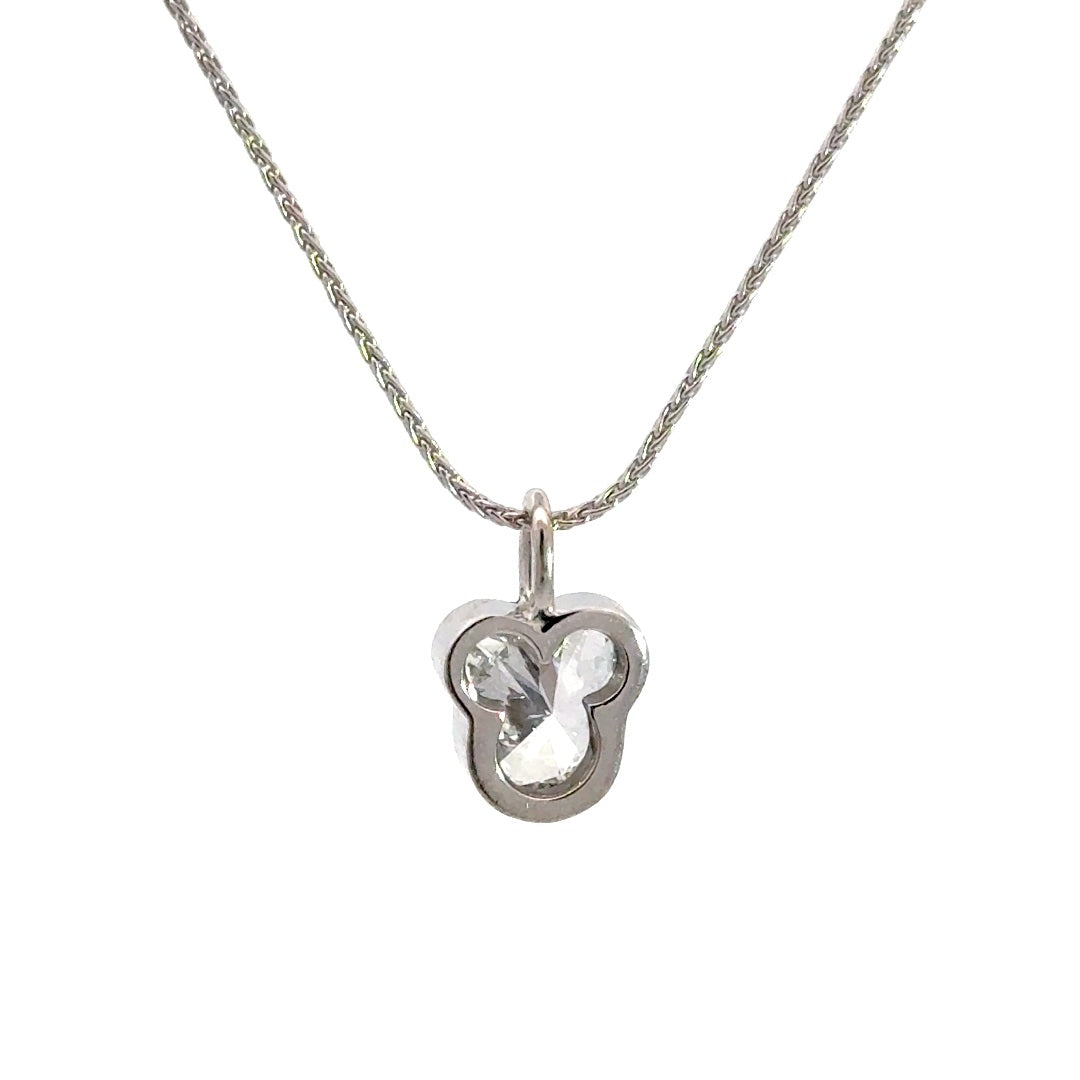 Back view of silver necklace with a diamond pendant shaped like a Mickey Mouse head  in a bezel setting