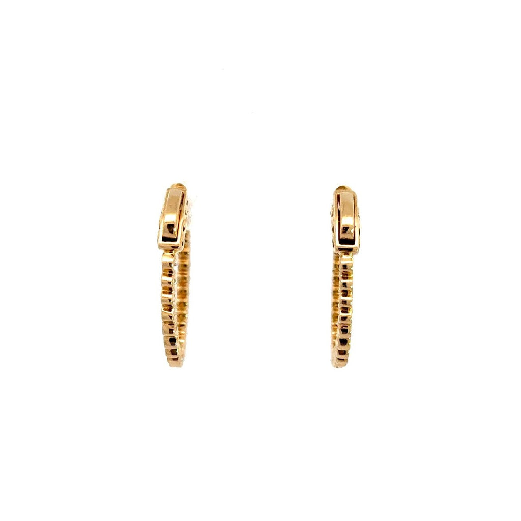 Back view of pair of gold hoop diamond earrings on a white background