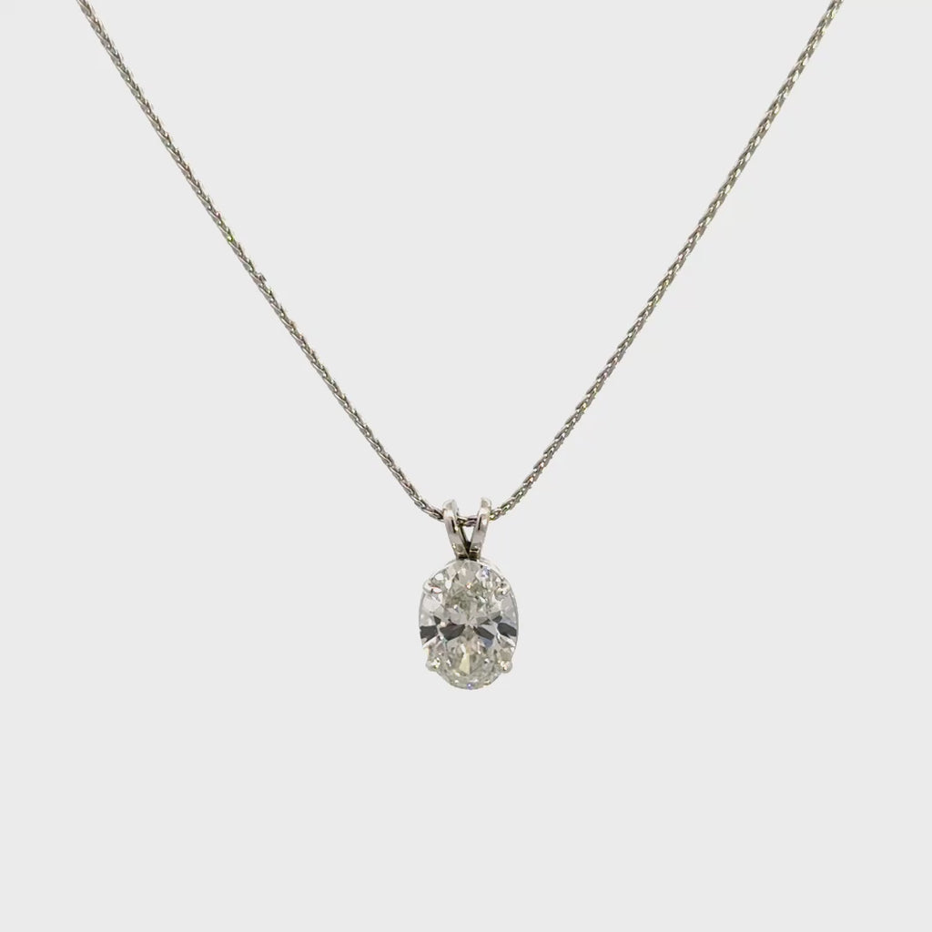 Slver necklace with oval cut diamond pendant