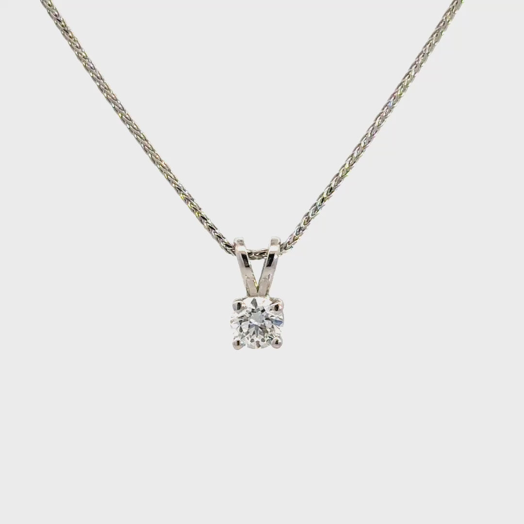 White gold diamond necklace on a white background.