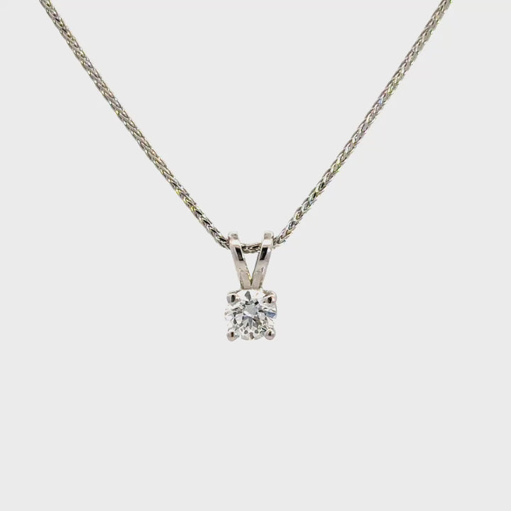 White gold diamond necklace on a white background.